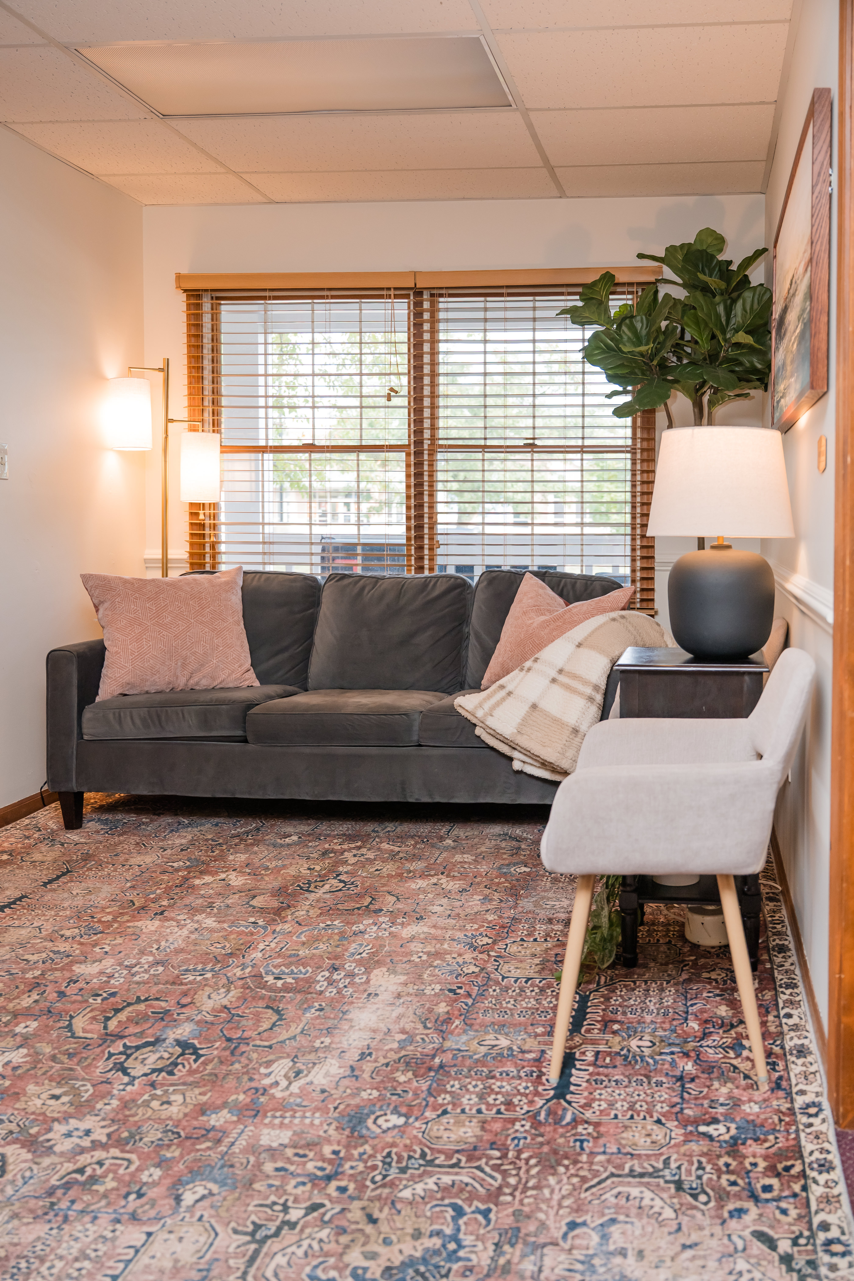 Cozy office with couch and chair.